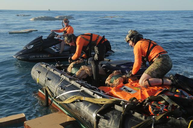 NASA image: SpaceX Recovery Trainer Egress and Handling Testing