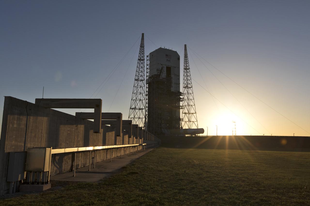 In this sunrise photograph, the first stage of a United Launch Alliance Delta IV Heavy rocket is at the Vertical Integration Facility near Space Launch Complex 37 at Cape Canaveral Air Force Station in Florida. The Delta IV Heavy will launch NASA's upcoming Parker Solar Probe mission in July 2018. The mission will perform the closest-ever observations of a star when it travels through the Sun's atmosphere, called the corona. The probe will rely on measurements and imaging to revolutionize our understanding of the corona and the Sun-Earth connection.