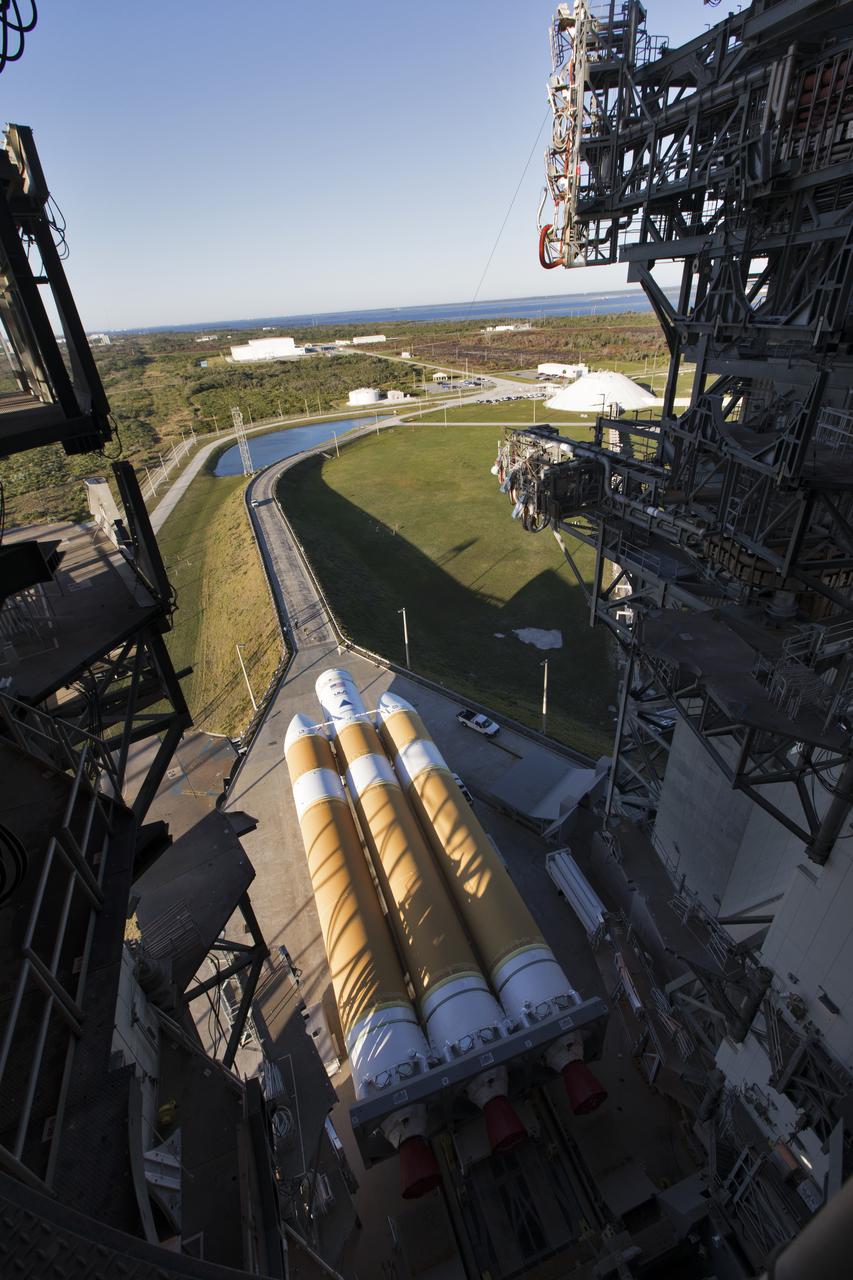 A view from above in the Vertical Integration Facility near Space Launch Complex 37 at Cape Canaveral Air Force Station in Florida. The first stage of a United Launch Alliance Delta IV Heavy is being prepared to be lifted to vertical in the facility. The Delta IV Heavy will launch NASA's upcoming Parker Solar Probe mission in July 2018. The mission will perform the closest-ever observations of a star when it travels through the Sun's atmosphere, called the corona. The probe will rely on measurements and imaging to revolutionize our understanding of the corona and the Sun-Earth connection. 