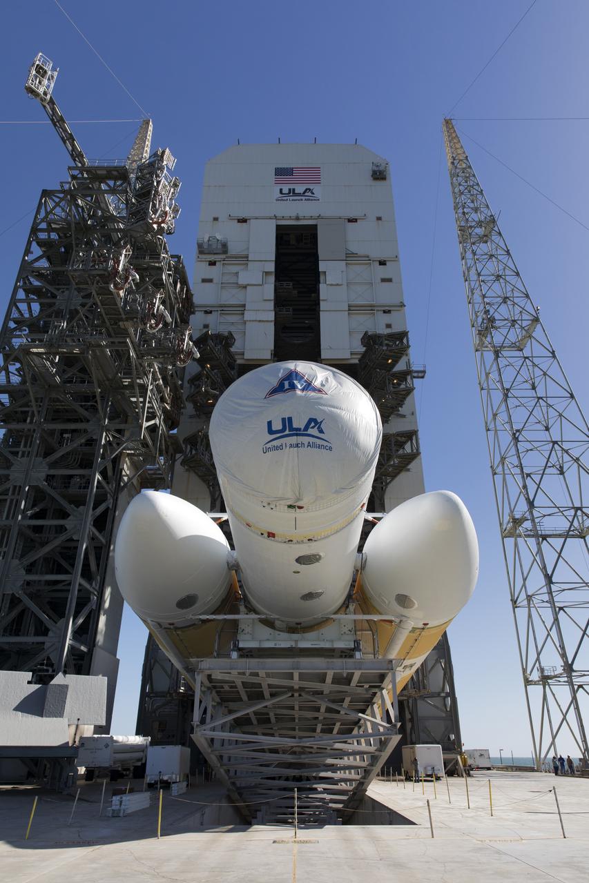 The United Launch Alliance Delta IV Heavy first stage is being lifted to the vertical position at the Vertical Integration Facility near Space Launch Complex 37 at Cape Canaveral Air Force Station in Florida. The Delta IV Heavy will launch NASA's upcoming Parker Solar Probe mission in July 2018. The mission will perform the closest-ever observations of a star when it travels through the Sun's atmosphere, called the corona. The probe will rely on measurements and imaging to revolutionize our understanding of the corona and the Sun-Earth connection.
