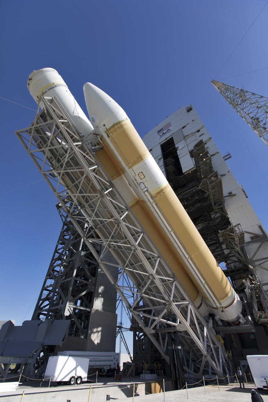 A brilliant blue sky serves as a backdrop as the United Launch Alliance Delta IV Heavy first stage is being lifted to the vertical position at the Vertical Integration Facility near Space Launch 37 at Cape Canaveral Air Force Station in Florida. The Delta IV Heavy will launch NASA's upcoming Parker Solar Probe mission in July 2018. The mission will perform the closest-ever observations of a star when it travels through the Sun's atmosphere, called the corona. The probe will rely on measurements and imaging to revolutionize our understanding of the corona and the Sun-Earth connection. 