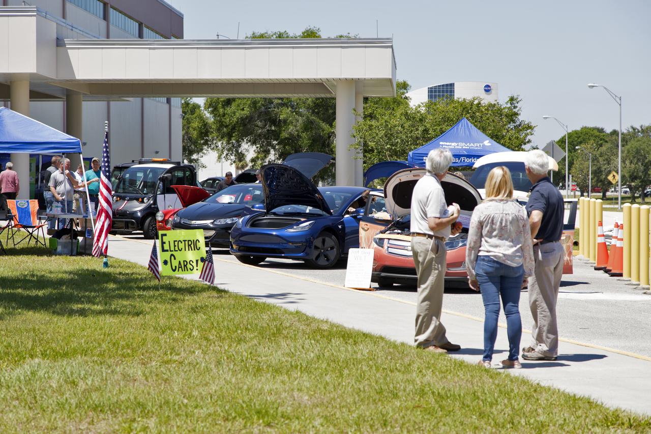 An array of electric vehicles are on display for Kennedy Space Center employees during the center’s annual Earth Day celebration. The two-day event featured approximately 50 exhibitors offering information on a variety of topics, including electric vehicles, sustainable lighting, renewable energy, Florida-friendly landscaping tips, Florida’s biking trails and more.