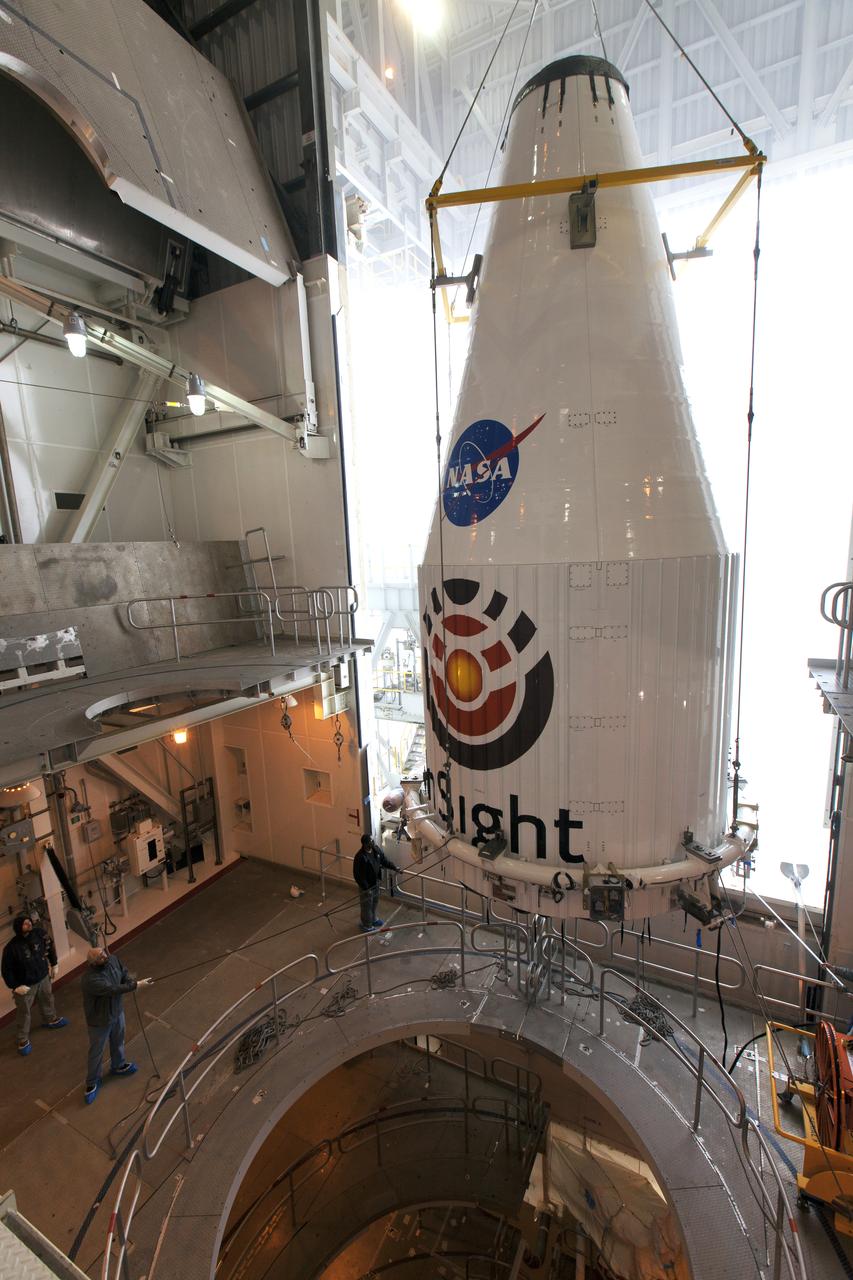 At Space Launch Complex 3 at Vandenberg Air Force Base in California, a crane is used to lift NASA's Interior Exploration using Seismic Investigations, Geodesy and Heat Transport, or InSight, Mars lander for mating atop a United Launch Alliance Atlas V rocket. InSight will be the first mission to look deep beneath the Martian surface. It will study the planet's interior by measuring its heat output and listen for marsquakes. The spacecraft will use the seismic waves generated by marsquakes to develop a map of the planet’s deep interior. The resulting insight into Mars’ formation will provide a better understanding of how other rocky planets, including Earth, were created. InSight is scheduled for liftoff May 5, 2018.