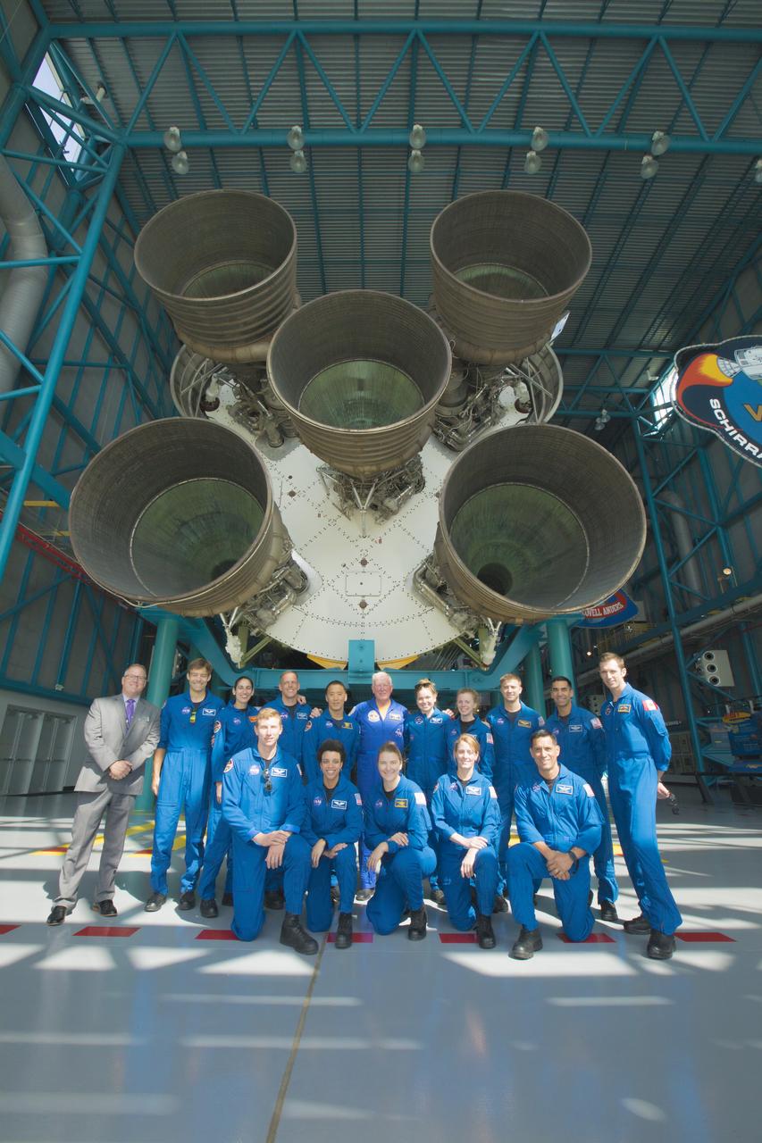 The 2017 class of astronaut candidates are inside the Saturn V Center at the Kennedy Space Center Visitor Complex near NASA's Kennedy Space Center in Florida. The candidates toured center facilities, including the Neil Armstrong Operations and Checkout Building high bay; the Launch Control Center, Launch Pad 39B, and the Vehicle Assembly Building. They also toured Boeing's Commercial Crew and Cargo Facility, United Launch Alliance's Space Launch Complex 41 at Cape Canaveral Air Force Station, and SpaceX's Launch Pad 39A at Kennedy. The candidates will spend about two years getting to know the space station systems and learning how to spacewalk, speak Russian, control the International Space Station's robotic arm and fly T-38s, before they're eligible to be assigned to a mission.