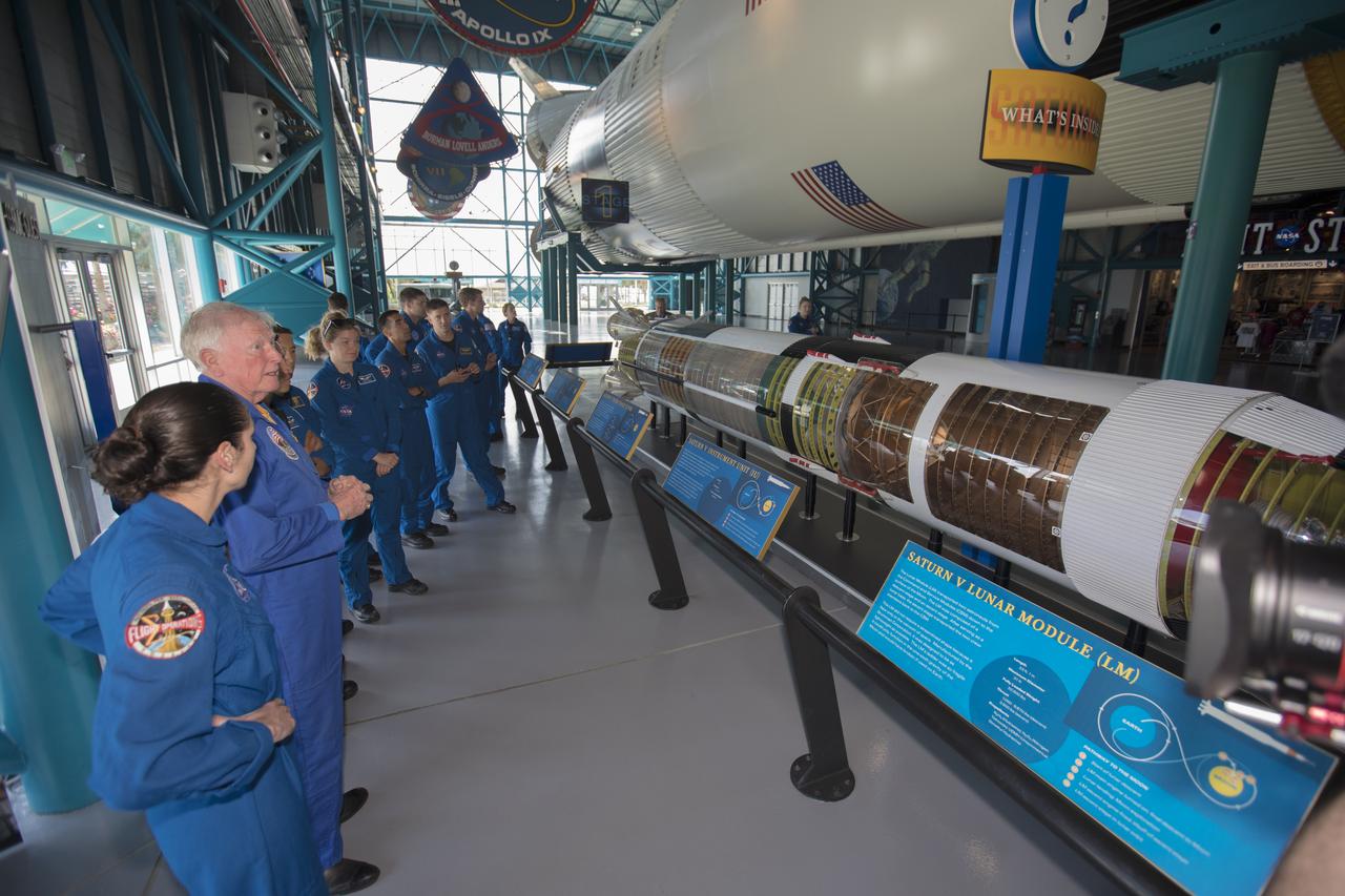 The 2017 class of astronaut candidates are inside the Saturn V Center at the Kennedy Space Center Visitor Complex near NASA's Kennedy Space Center in Florida. The candidates toured center facilities, including the Neil Armstrong Operations and Checkout Building high bay; the Launch Control Center, Launch Pad 39B, and the Vehicle Assembly Building. They also toured Boeing's Commercial Crew and Cargo Facility, United Launch Alliance's Space Launch Complex 41 at Cape Canaveral Air Force Station, and SpaceX's Launch Pad 39A at Kennedy. The candidates will spend about two years getting to know the space station systems and learning how to spacewalk, speak Russian, control the International Space Station's robotic arm and fly T-38s, before they're eligible to be assigned to a mission.