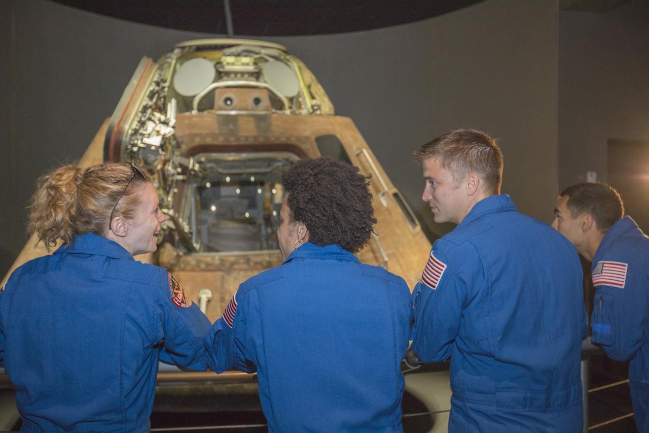 The 2017 class of astronaut candidates are inside the Saturn V Center at the Kennedy Space Center Visitor Complex near NASA's Kennedy Space Center in Florida. The candidates toured center facilities, including the Neil Armstrong Operations and Checkout Building high bay; the Launch Control Center, Launch Pad 39B, and the Vehicle Assembly Building. They also toured Boeing's Commercial Crew and Cargo Facility, United Launch Alliance's Space Launch Complex 41 at Cape Canaveral Air Force Station, and SpaceX's Launch Pad 39A at Kennedy. The candidates will spend about two years getting to know the space station systems and learning how to spacewalk, speak Russian, control the International Space Station's robotic arm and fly T-38s, before they're eligible to be assigned to a mission.
