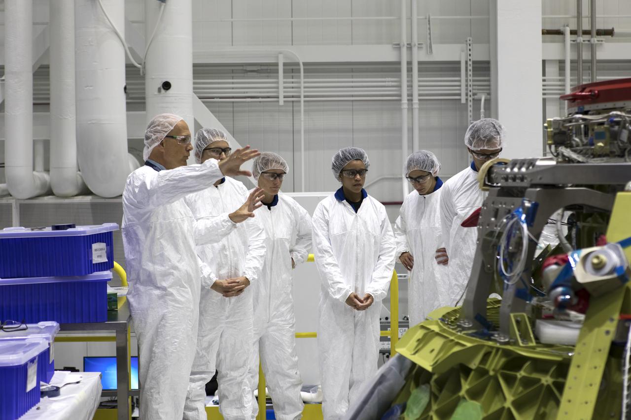The 2017 class of astronaut candidates tour Boeing's Commercial Crew and Cargo Facility at NASA's Kennedy Space Center in Florida on May 1. They are at the center for a familiarization tour of facilities, including the Neil Armstrong Operations and Checkout Building high bay; the Launch Control Center, Launch Complex 39B, and the Vehicle Assembly Building. They also toured United Launch Alliance's Space Launch Complex 41 at Cape Canaveral Air Force Station, and SpaceX's Launch Complex 39A at Kennedy. The candidates will spend about two years getting to know the space station systems and learning how to spacewalk, speak Russian, control the International Space Station's robotic arm and fly T-38s, before they're eligible to be assigned to a mission. 
