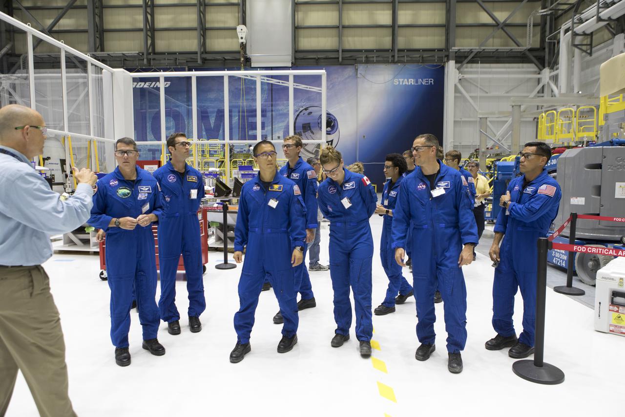 The 2017 class of astronaut candidates tour Boeing's Commercial Crew and Cargo Facility at NASA's Kennedy Space Center in Florida on May 1. They are at the center for a familiarization tour of facilities, including the Neil Armstrong Operations and Checkout Building high bay; the Launch Control Center, Launch Complex 39B, and the Vehicle Assembly Building. They also toured United Launch Alliance's Space Launch Complex 41 at Cape Canaveral Air Force Station, and SpaceX's Launch Complex 39A at Kennedy. The candidates will spend about two years getting to know the space station systems and learning how to spacewalk, speak Russian, control the International Space Station's robotic arm and fly T-38s, before they're eligible to be assigned to a mission. 