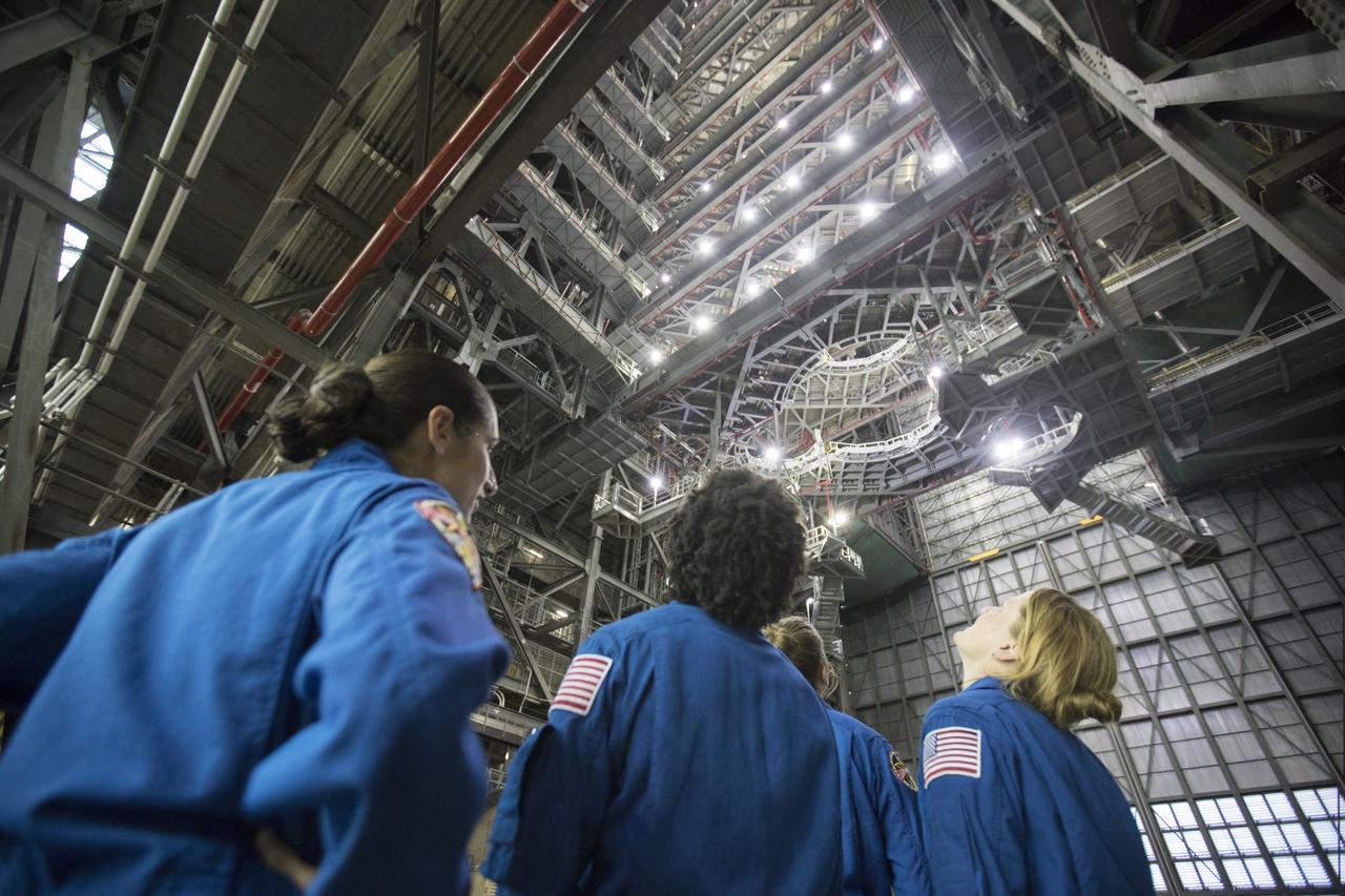 Members of the 2017 class of astronaut candidates view the new work platforms in High Bay 3 of the Vehicle Assembly Building during a familiarization tour at NASA's Kennedy Space Center in Florida. The candidates toured center facilities, including the Neil Armstrong Operations and Checkout Building high bay, Launch Control Center, Launch Pad 39B, and the Space Station Processing Facility. They also toured Boeing's Commercial Crew and Cargo Facility, United Launch Alliance's Space Launch Complex 41 at Cape Canaveral Air Force Station, and SpaceX's Launch Pad 39A at Kennedy. The candidates will spend about two years getting to know the space station systems and learning how to spacewalk, speak Russian, control the International Space Station's robotic arm and fly T-38s, before they're eligible to be assigned to a mission.