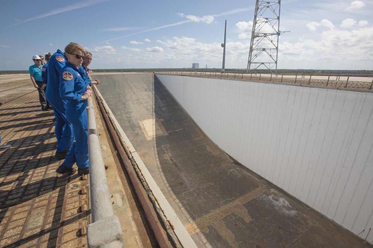 Members of the 2017 class of astronaut candidates view the flame trench at Launch Pad 39B during a familiarization tour of facilities at NASA's Kennedy Space Center in Florida. The candidates toured center facilities, including the Vehicle Assembly Building, Launch Control Center, Neil Armstrong Operations and Checkout Building high bay and the Space Station Processing Facility. They also toured Boeing's Commercial Crew and Cargo Facility, United Launch Alliance's Space Launch Complex 41 at Cape Canaveral Air Force Station, and SpaceX's Launch Pad 39A at Kennedy. The candidates will spend about two years getting to know the space station systems and learning how to spacewalk, speak Russian, control the International Space Station's robotic arm and fly T-38s, before they're eligible to be assigned to a mission.
