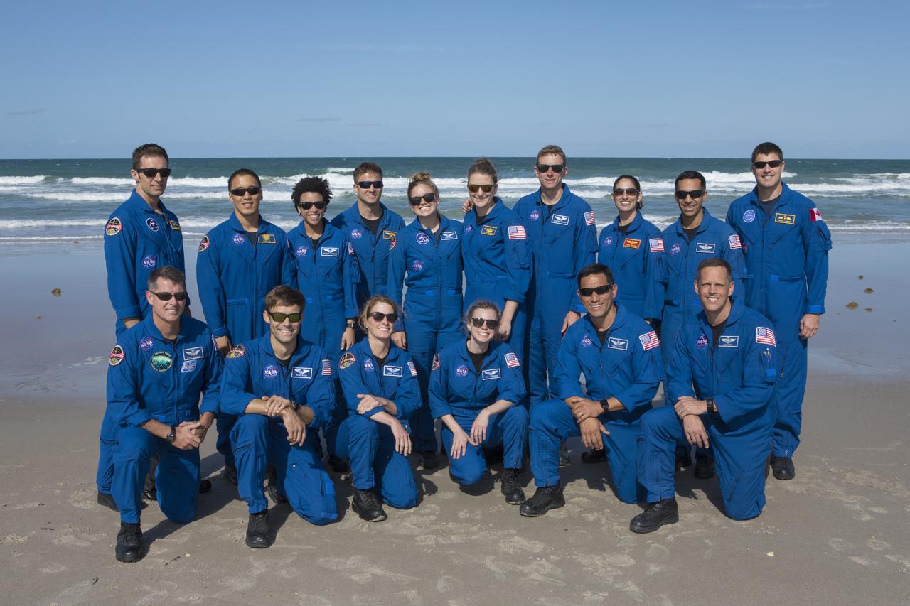 Members of the 2017 class of astronaut candidates pause for a group photo on the beach after a familiarization tour of the Beach House at NASA's Kennedy Space Center in Florida. The candidates toured center facilities, including the Vehicle Assembly Building, Launch Control Center, Neil Armstrong Operations and Checkout Building high bay, Launch Pad 39B and the Space Station Processing Facility. They also toured Boeing's Commercial Crew and Cargo Facility, United Launch Alliance's Space Launch Complex 41 at Cape Canaveral Air Force Station, and SpaceX's Launch Pad 39A at Kennedy. The candidates will spend about two years getting to know the space station systems and learning how to spacewalk, speak Russian, control the International Space Station's robotic arm and fly T-38s, before they're eligible to be assigned to a mission.