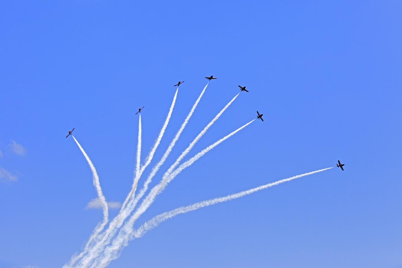 Canadian Forces Snowbirds perform an aerial acrobatic maneuver over NASA's Kennedy Space Center in Florida during a practice flight on May 9, 2018, between their scheduled U.S. air shows.