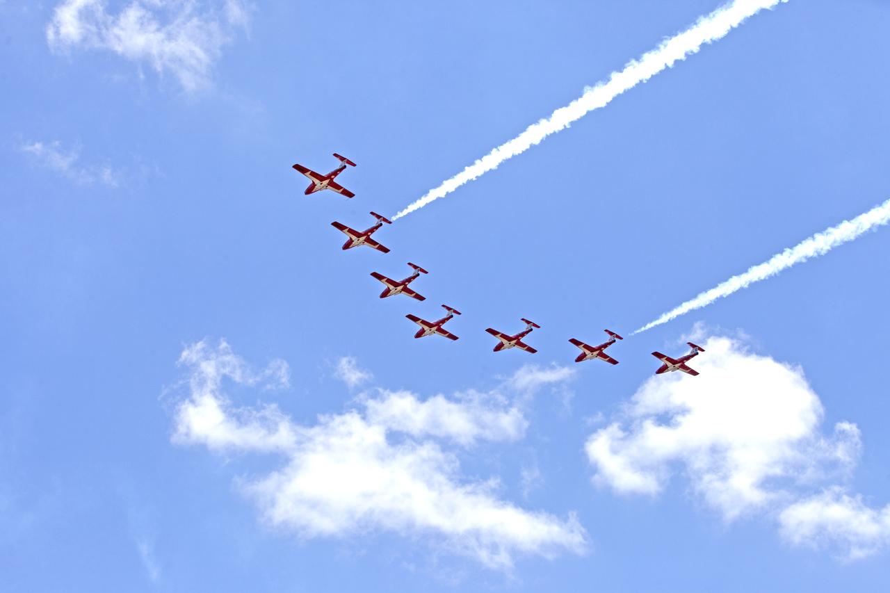 Canadian Forces Snowbirds fly in formation over NASA's Kennedy Space Center in Florida during a practice flight on May 9, 2018, between their scheduled U.S. air shows.