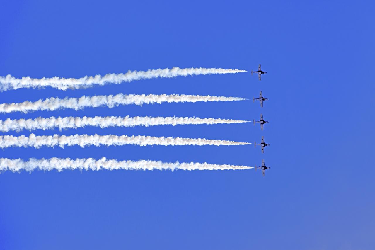 Canadian Forces Snowbirds fly in formation over NASA's Kennedy Space Center in Florida during a practice flight on May 9, 2018, between their scheduled U.S. air shows.