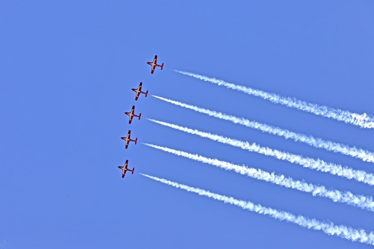 Canadian Forces Snowbirds fly in formation over NASA's Kennedy Space Center in Florida during a practice flight on May 9, 2018, between their scheduled U.S. air shows.