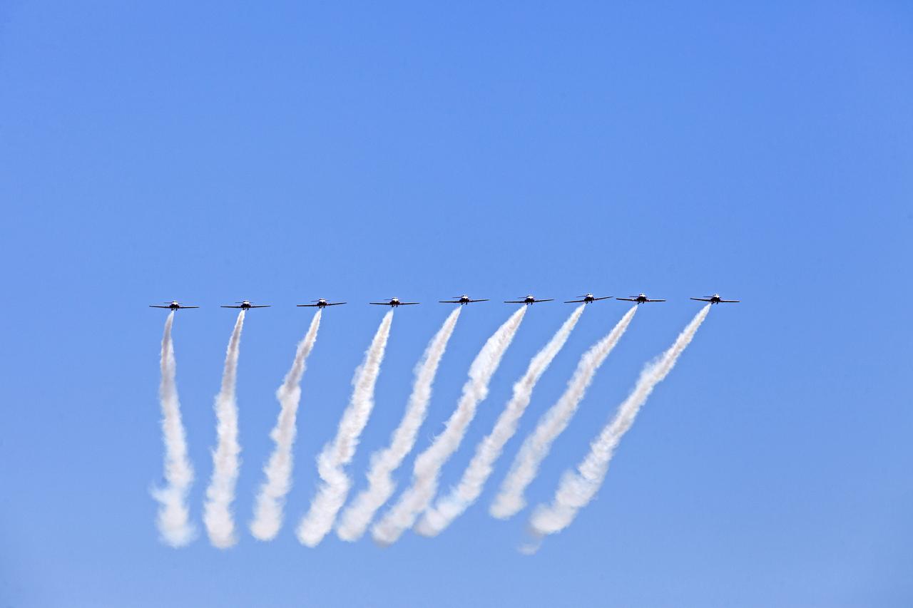 Canadian Forces Snowbirds fly in formation over NASA's Kennedy Space Center in Florida during a practice flight on May 9, 2018, between their scheduled U.S. air shows.