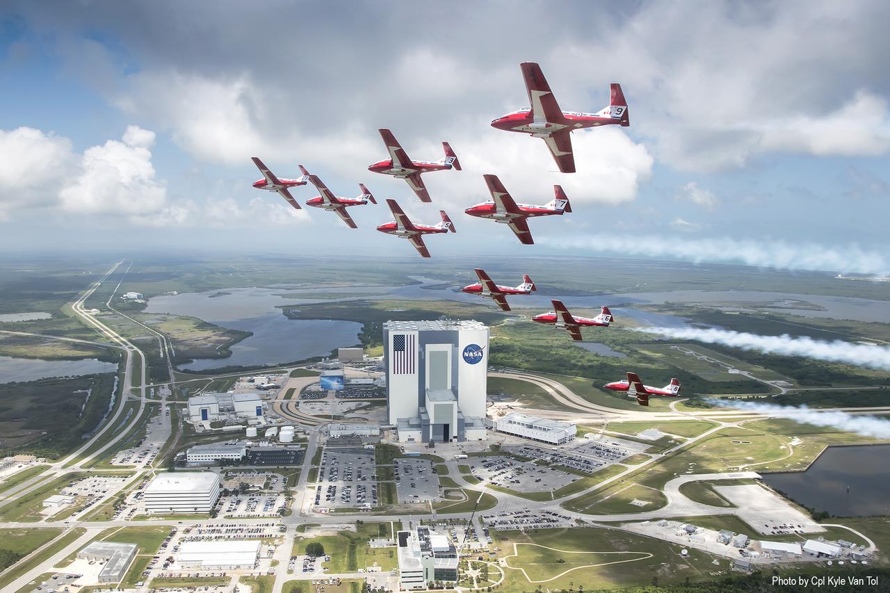 The Canadian Forces Snowbirds fly in a tribute Shuttle formation over NASA’s Kennedy Space Center in Florida. The Snowbirds, Canada’s air demonstration team, carried out a practice flight over Kennedy and nearby Cape Canaveral Air Force Station in Florida on Wednesday, May 9, 2018, between their scheduled U.S. air shows.
