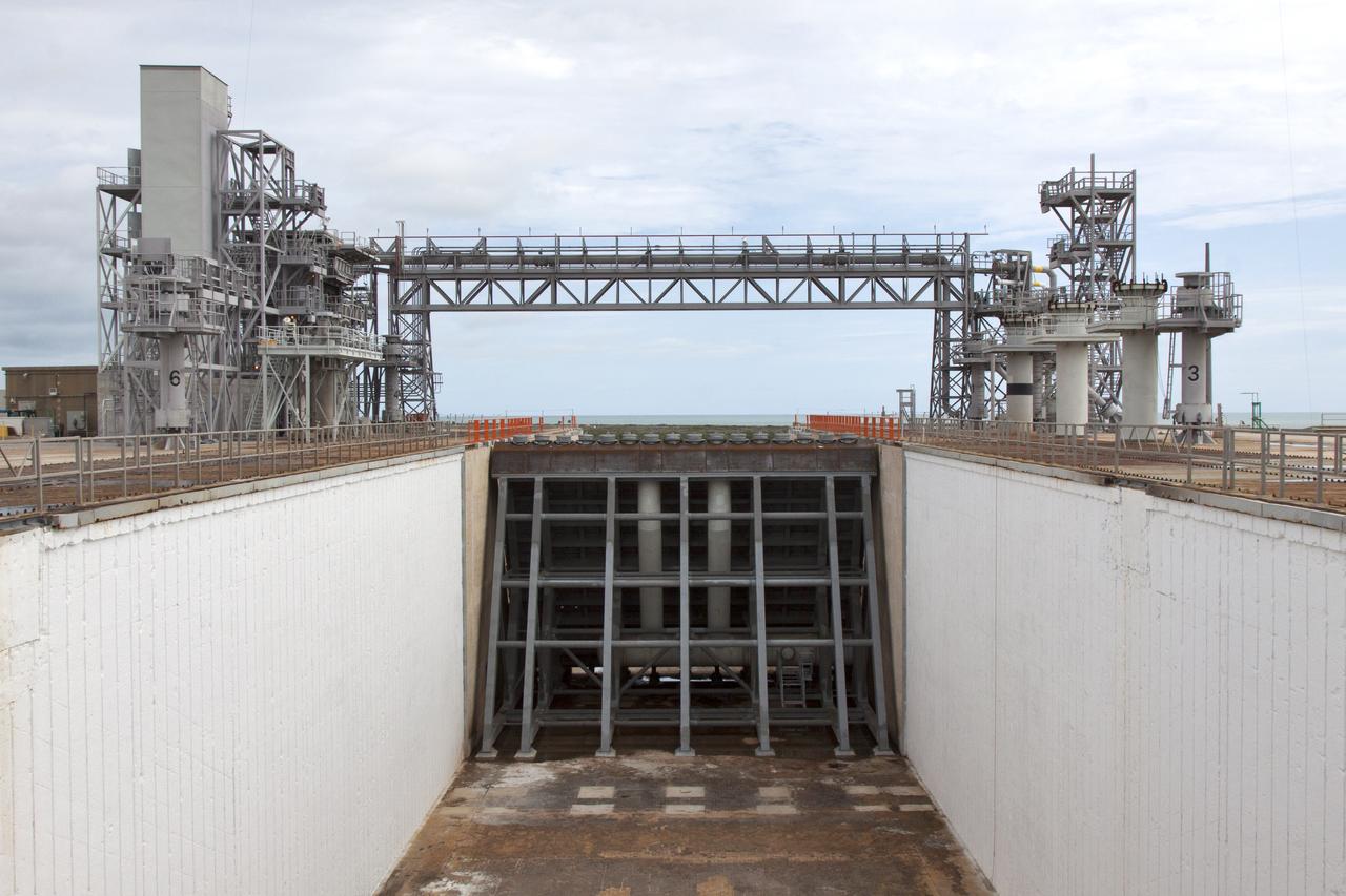 Construction is complete on the main flame deflector in the flame trench at Launch Complex 39B at NASA's Kennedy Space Center in Florida. The flame deflector will safely deflect the plume exhaust from NASA's Space Launch System rocket during launch. It will divert the rocket's exhaust, pressure and intense heat to the north at liftoff. In view is the south side of the main flame deflector. The Exploration Ground Systems Program at Kennedy is refurbishing the pad to support the launch of the SLS rocket and Orion on Exploration Mission-1, and helping to transform the space center into a multi-user spaceport.