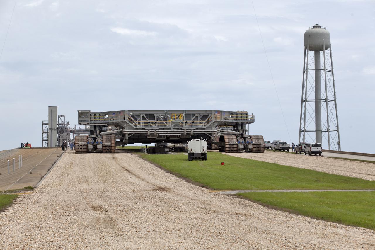 Crawler-transporter 2 (CT-2) moves slowly up the ramp to the surface of Launch Pad 39B for a fit check on May 22, 2018, at NASA's Kennedy Space Center in Florida. The test drive to the pad confirms that all of the recent modifications to CT-2 and Pad 39B are operational to support the launch of the agency's Space Launch System rocket and Orion spacecraft on Exploration Mission-1. Exploration Ground Systems managed the modifications and upgrades to CT-2 and Pad 39B to prepare for EM-1 and deep space exploration missions.