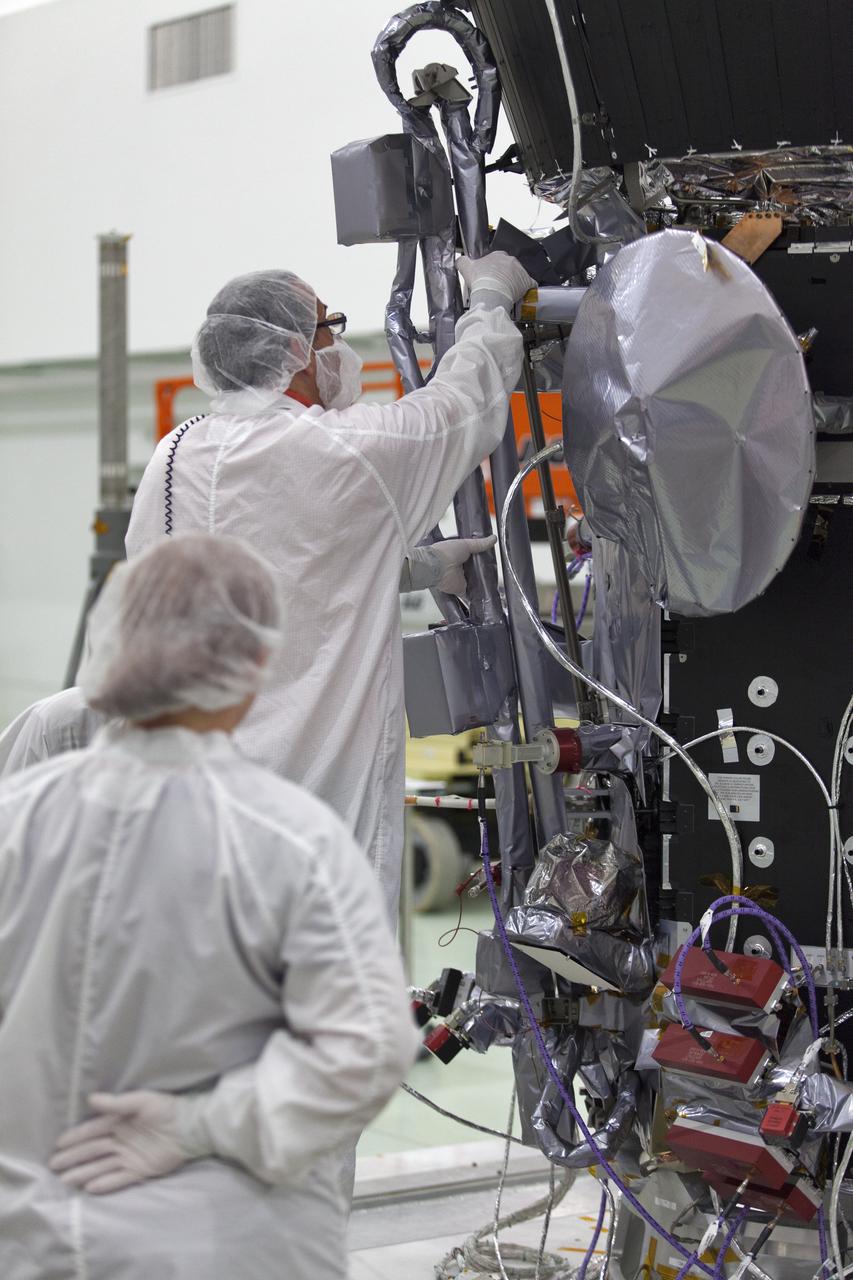 In the Astrotech processing facility in Titusville, Florida, near NASA's Kennedy Space Center, on Wednesday, May 23, 2018, technicians and engineers deploy the magnetometer boom on NASA's Parker Solar Probe. The Parker Solar Probe will launch on a United Launch Alliance Delta IV Heavy rocket from Space Launch Complex 37 at Cape Canaveral Air Force Station in Florida no earlier than Aug. 4, 2018. The mission will perform the closest-ever observations of a star when it travels through the Sun's atmosphere, called the corona. The probe will rely on measurements and imaging to revolutionize our understanding of the corona and the Sun-Earth connection.