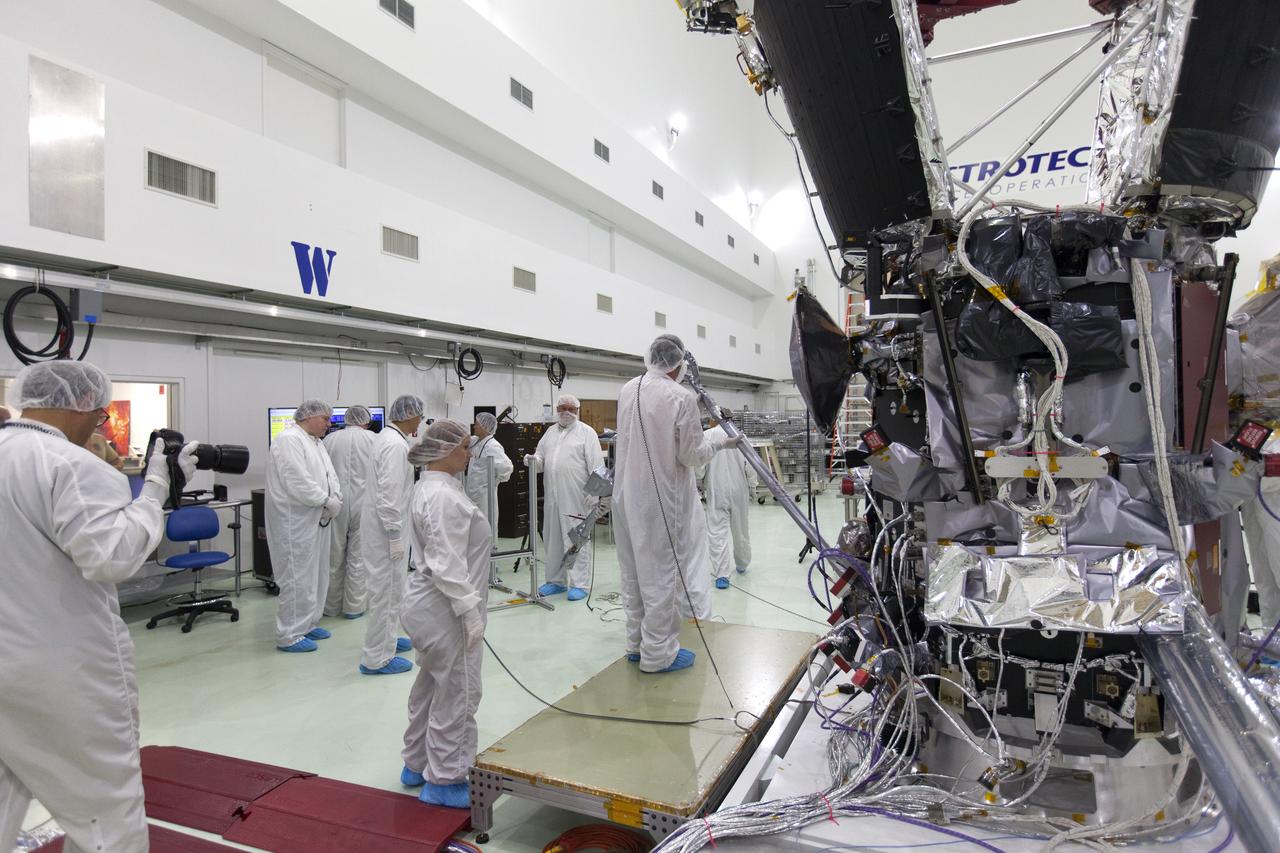 In the Astrotech processing facility in Titusville, Florida, near NASA's Kennedy Space Center, on Wednesday, May 23, 2018, technicians and engineers deploy the magnetometer boom on NASA's Parker Solar Probe. The Parker Solar Probe will launch on a United Launch Alliance Delta IV Heavy rocket from Space Launch Complex 37 at Cape Canaveral Air Force Station in Florida no earlier than Aug. 4, 2018. The mission will perform the closest-ever observations of a star when it travels through the Sun's atmosphere, called the corona. The probe will rely on measurements and imaging to revolutionize our understanding of the corona and the Sun-Earth connection.