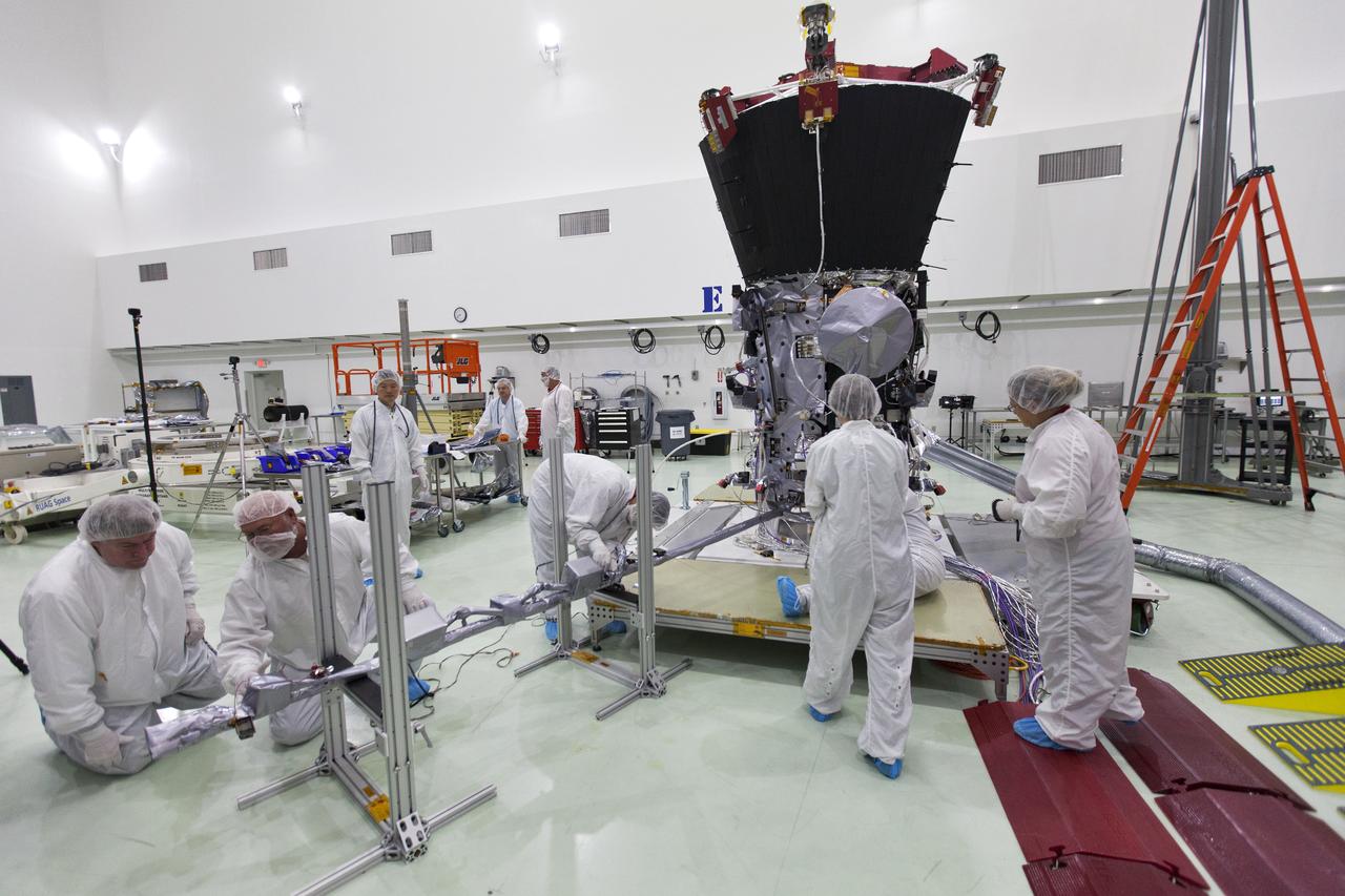 In the Astrotech processing facility in Titusville, Florida, near NASA's Kennedy Space Center, on Wednesday, May 23, 2018, technicians and engineers deploy the magnetometer boom on NASA's Parker Solar Probe. The Parker Solar Probe will launch on a United Launch Alliance Delta IV Heavy rocket from Space Launch Complex 37 at Cape Canaveral Air Force Station in Florida no earlier than Aug. 4, 2018. The mission will perform the closest-ever observations of a star when it travels through the Sun's atmosphere, called the corona. The probe will rely on measurements and imaging to revolutionize our understanding of the corona and the Sun-Earth connection.