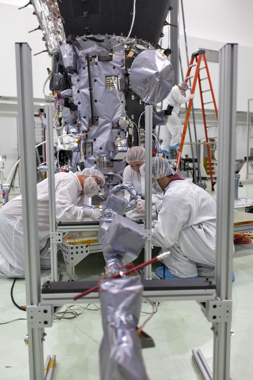 In the Astrotech processing facility in Titusville, Florida, near NASA's Kennedy Space Center, on Wednesday, May 23, 2018, technicians and engineers deploy the magnetometer boom on NASA's Parker Solar Probe. The Parker Solar Probe will launch on a United Launch Alliance Delta IV Heavy rocket from Space Launch Complex 37 at Cape Canaveral Air Force Station in Florida no earlier than Aug. 4, 2018. The mission will perform the closest-ever observations of a star when it travels through the Sun's atmosphere, called the corona. The probe will rely on measurements and imaging to revolutionize our understanding of the corona and the Sun-Earth connection.