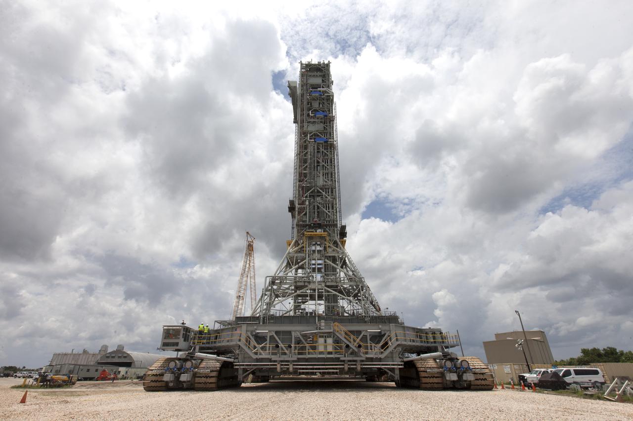 Preparations are underway May 31, 2018, to move crawler-transporter 2 (CT-2) under the mobile launcher at NASA's Kennedy Space Center in Florida. Three lifts will be performed to practice lifting procedures, validate interface locations, confirm the weight of the mobile launcher, and develop a baseline for modal analysis. The mobile launcher is equipped with a number of lines, called umbilicals, which will connect to NASA's Space Launch System (SLS) and Orion. CT-2 has been upgraded to handle the weight of the mobile launcher with SLS and Orion atop. Exploration Ground Systems is preparing the ground systems necessary to support the SLS and Orion spacecraft for Exploration Mission-1 and deep space missions.