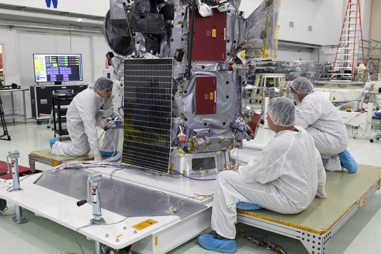 NASA's Parker Solar Probe solar arrays are deployed for testing at the Astrotech processing facility in Titusville, Florida, near NASA's Kennedy Space Center on Sunday, June 3, 2018. The Parker Solar Probe will launch on a United Launch Alliance Delta IV Heavy rocket from Space Launch Complex 37 at Cape Canaveral Air Force Station in Florida no earlier than Aug. 4, 2018. The mission will perform the closest-ever observations of a star when it travels through the Sun's atmosphere, called the corona. The probe will rely on measurements and imaging to revolutionize our understanding of the corona and the Sun-Earth connection.