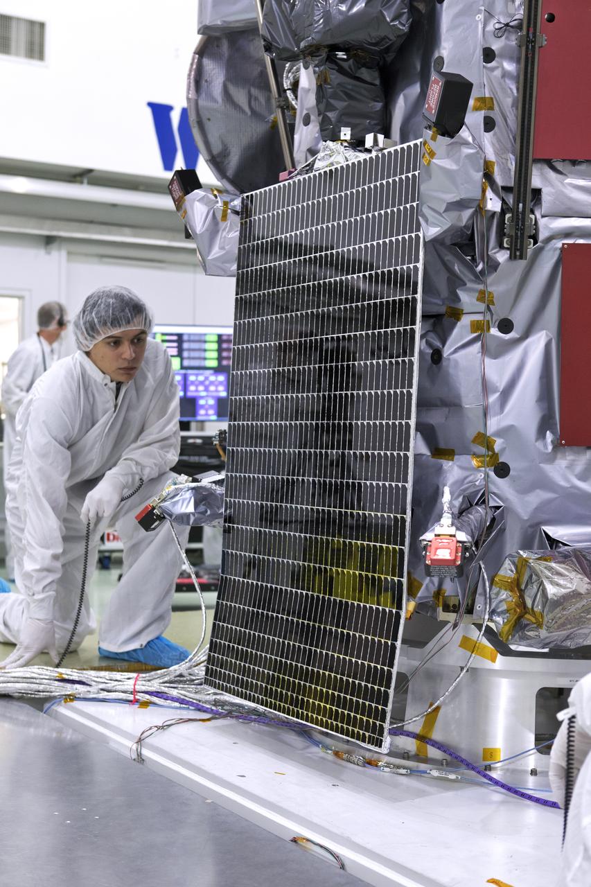 NASA's Parker Solar Probe solar arrays are deployed for testing at the Astrotech processing facility in Titusville, Florida, near NASA's Kennedy Space Center on Sunday, June 3, 2018. The Parker Solar Probe will launch on a United Launch Alliance Delta IV Heavy rocket from Space Launch Complex 37 at Cape Canaveral Air Force Station in Florida no earlier than Aug. 4, 2018. The mission will perform the closest-ever observations of a star when it travels through the Sun's atmosphere, called the corona. The probe will rely on measurements and imaging to revolutionize our understanding of the corona and the Sun-Earth connection.