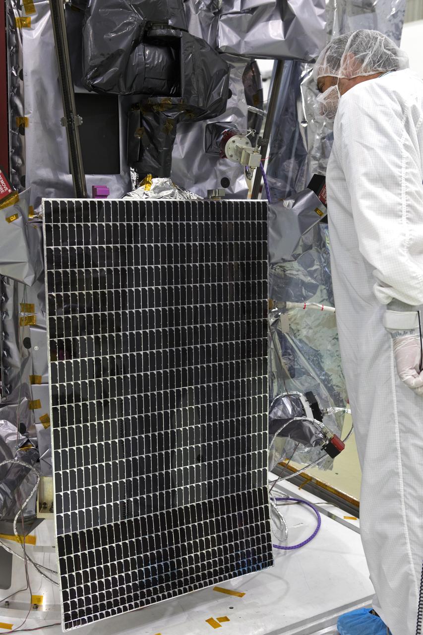 NASA's Parker Solar Probe solar arrays are deployed for testing at the Astrotech processing facility in Titusville, Florida, near NASA's Kennedy Space Center on Sunday, June 3, 2018. The Parker Solar Probe will launch on a United Launch Alliance Delta IV Heavy rocket from Space Launch Complex 37 at Cape Canaveral Air Force Station in Florida no earlier than Aug. 4, 2018. The mission will perform the closest-ever observations of a star when it travels through the Sun's atmosphere, called the corona. The probe will rely on measurements and imaging to revolutionize our understanding of the corona and the Sun-Earth connection.