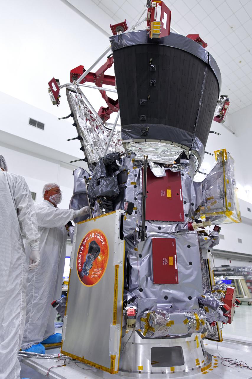 In the Astrotech processing facility in Titusville, Florida, near NASA's Kennedy Space Center, on Tuesday, June 5, 2018, technicians and engineers prepare NASA's Parker Solar Probe for light bar testing. The Parker Solar Probe will launch on a United Launch Alliance Delta IV Heavy rocket from Space Launch Complex 37 at Cape Canaveral Air Force Station in Florida no earlier than Aug. 4, 2018. The mission will perform the closest-ever observations of a star when it travels through the Sun's atmosphere, called the corona. The probe will rely on measurements and imaging to revolutionize our understanding of the corona and the Sun-Earth connection.