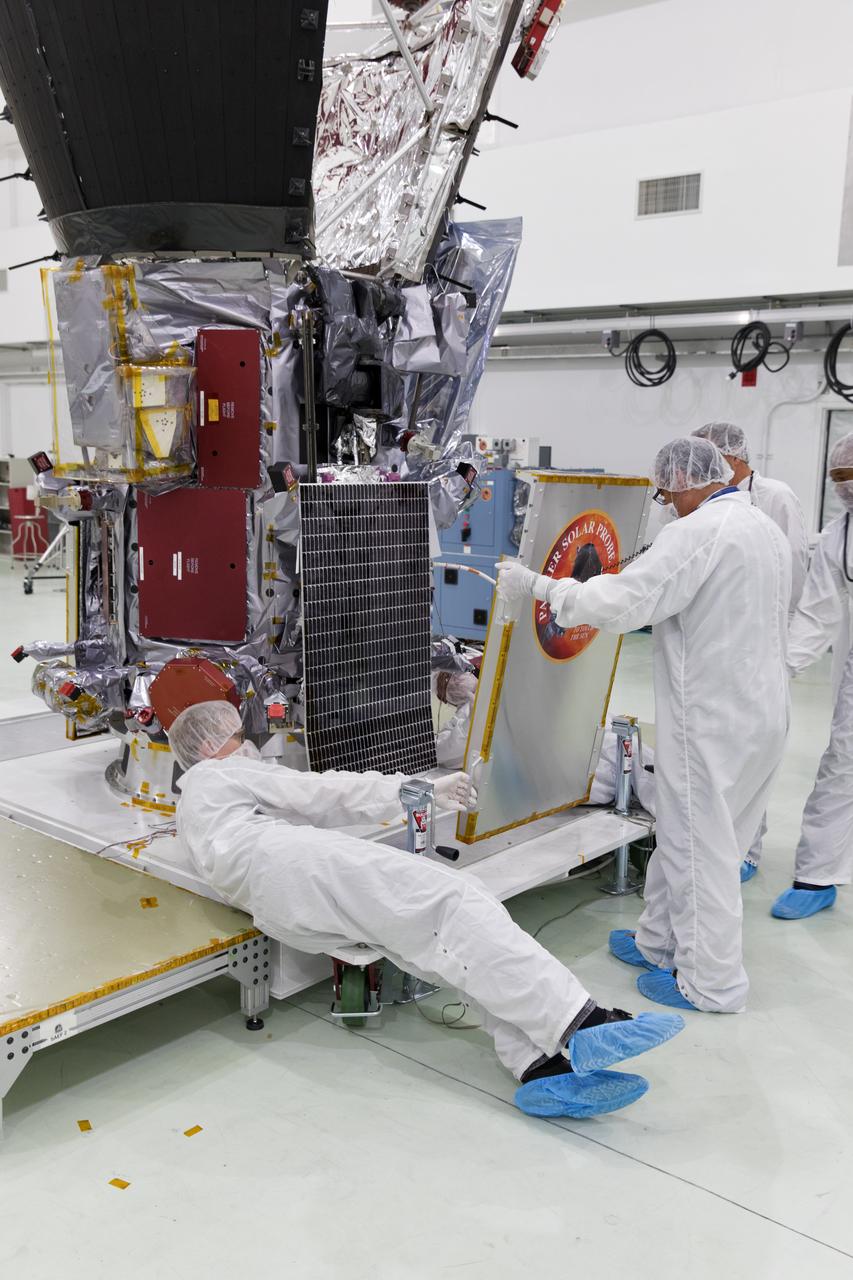 In the Astrotech processing facility in Titusville, Florida, near NASA's Kennedy Space Center, on Tuesday, June 5, 2018, technicians and engineers prepare NASA's Parker Solar Probe for light bar testing. The Parker Solar Probe will launch on a United Launch Alliance Delta IV Heavy rocket from Space Launch Complex 37 at Cape Canaveral Air Force Station in Florida no earlier than Aug. 4, 2018. The mission will perform the closest-ever observations of a star when it travels through the Sun's atmosphere, called the corona. The probe will rely on measurements and imaging to revolutionize our understanding of the corona and the Sun-Earth connection.
