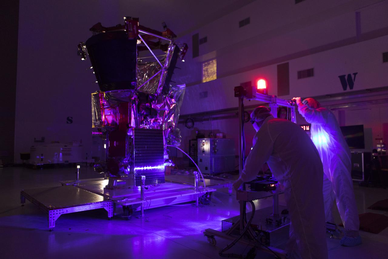 In the Astrotech processing facility in Titusville, Florida, near NASA's Kennedy Space Center, on Tuesday, June 5, 2018, technicians and engineers perform light bar testing on NASA's Parker Solar Probe. The Parker Solar Probe will launch on a United Launch Alliance Delta IV Heavy rocket from Space Launch Complex 37 at Cape Canaveral Air Force Station in Florida no earlier than Aug. 4, 2018. The mission will perform the closest-ever observations of a star when it travels through the Sun's atmosphere, called the corona. The probe will rely on measurements and imaging to revolutionize our understanding of the corona and the Sun-Earth connection.