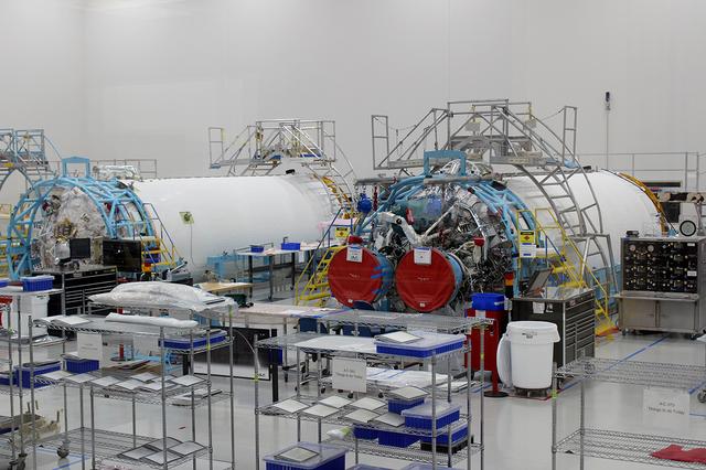 The United Launch Alliance (ULA) Crew Flight Test dual engine, at left, and the Orbital Flight test dual engine, at right, for the Centaur stage of the Atlas V rocket are in production on June 11, 2018, at ULA's factory in Decatur, Alabama. Boeing's CST-100 Starliner will launch on its first uncrewed flight test on the ULA Atlas V rocket. The Starliner is being developed and manufactured in partnership with NASA's Commercial Crew Program to return human spaceflight capabilities to the U.S.