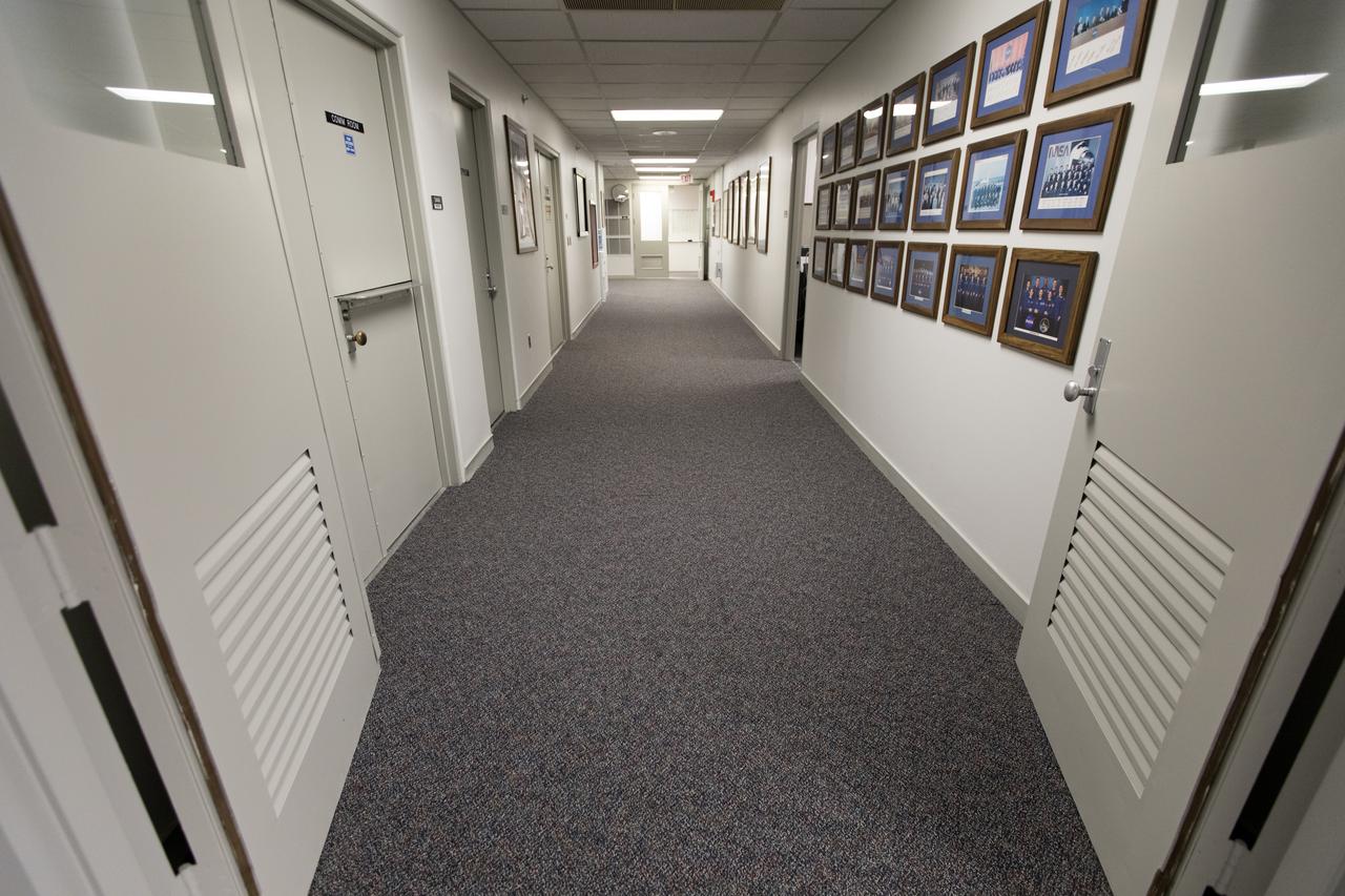 The hallway of the astronaut crew quarters at Kennedy Space Center in Florida reflects new carpeting and a fresh coat of paint. The crew quarters, located on the third floor of the Neil Armstrong Operations and Checkout Building, has been recently upgraded in preparation for Kennedy’s return to human spaceflight.