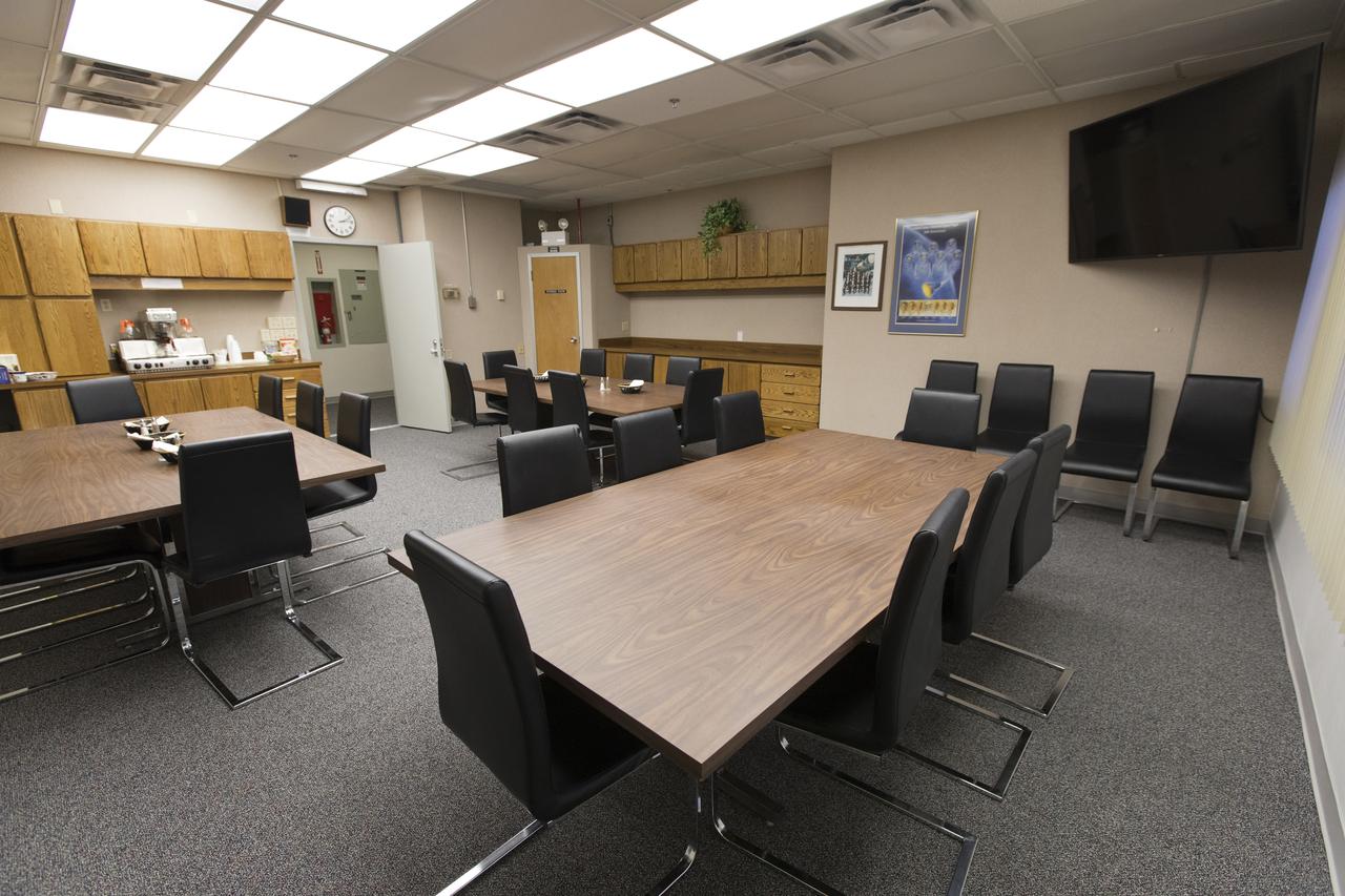 During the Space Shuttle Program, the dining room of the astronaut crew quarters, located in the Neil Armstrong Operations and Checkout Building at Kennedy Space Center in Florida, was a popular place. Located just off of the kitchen, the dining room features lighting that can simulate broad daylight or evening hours. As Kennedy builds toward a return to human spaceflight, the crew quarters are being prepared to once again house mission-bound astronauts.