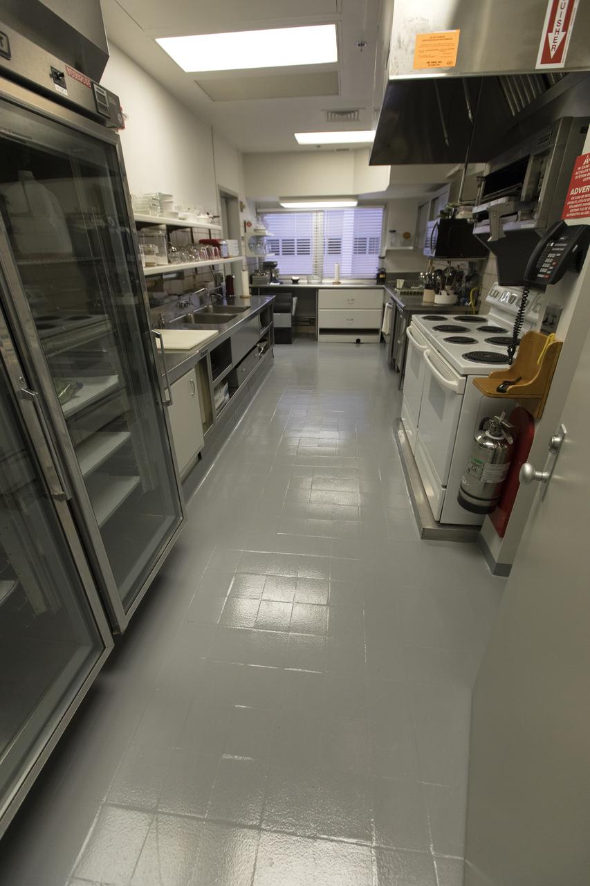 The kitchen in the astronaut crew quarters, located in the Neil Armstrong Operations and Checkout Building at Kennedy Space Center in Florida, is where the astronauts’ meals are prepared in the days leading up to a mission. Several improvements have been made to the crew quarters, including all new appliances in the kitchen.