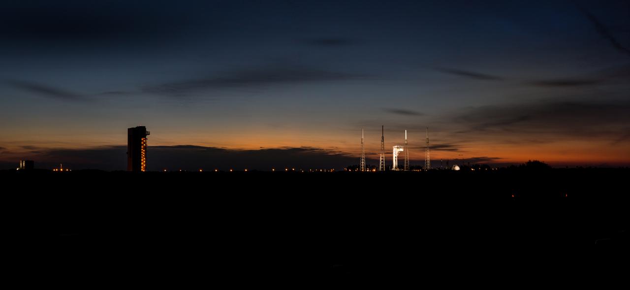 The sun sets on Cape Canaveral Air Force Station’s Launch Complex 41 in Florida during a Boeing/United Launch Alliance (ULA) emergency egress system demonstration on June 19, 2018. The emergency egress system features folding seats attached to slide wires. In the unlikely event of an emergency on launch day prior to liftoff, each person on the Crew Access Tower would get his or her own seat and slide more than 1,300 feet to a safe area. The Boeing CST-100 Starliner will launch on a ULA Atlas V rocket, carrying astronauts to the International Space Station