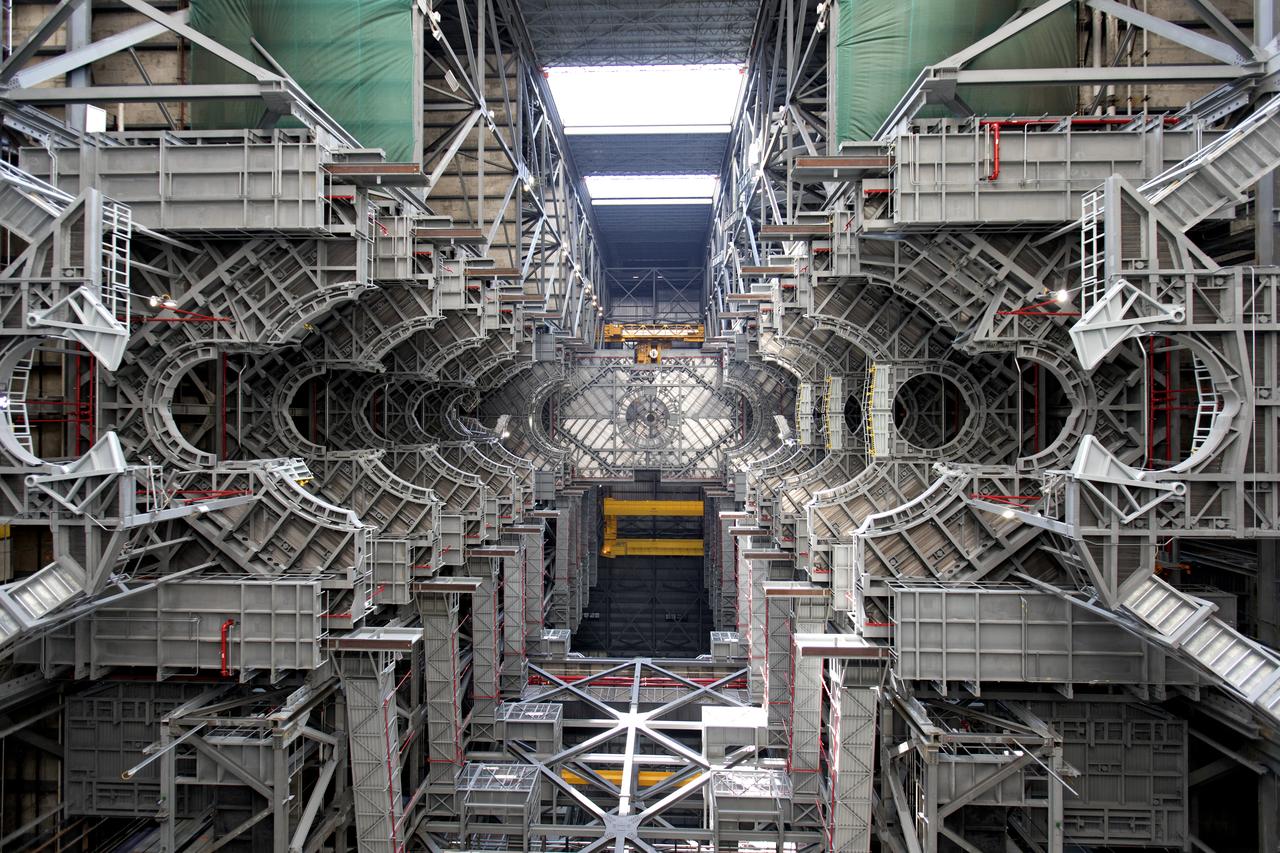 A view looking up at the 10 levels of work platforms in High Bay 3 inside the Vehicle Assembly Building (VAB) at NASA's Kennedy Space Center in Florida. The work platforms will surround and provide access for service and processing of NASA's Space Launch System rocket and Orion spacecraft. Exploration Ground Systems oversaw the upgrades and installation of the new work platforms to support the launch of the SLS and Orion on Exploration Mission-1 and deep space missions.