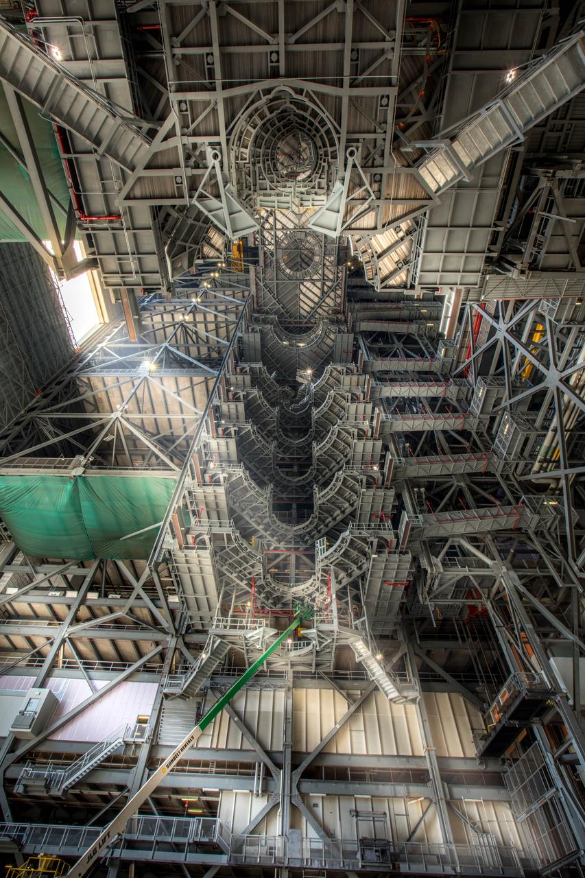 A view looking up at one side of the 10 levels of work platforms in High Bay 3 inside the Vehicle Assembly Building (VAB) at NASA's Kennedy Space Center in Florida. The work platforms will surround and provide access for service and processing of NASA's Space Launch System rocket and Orion spacecraft. Exploration Ground Systems oversaw the upgrades and installation of the new work platforms to support the launch of the SLS and Orion on Exploration Mission-1 and deep space missions.