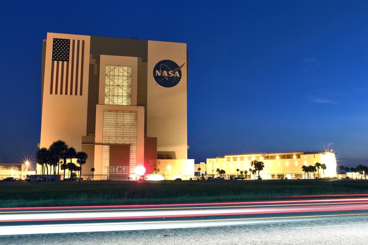 A sunrise time-lapse panoramic view of the iconic Vehicle Assembly Building (VAB) and Launch Control Center at NASA's Kennedy Space Center in Florida. Ten levels of work platforms have been installed in High Bay 3 of the VAB. They will surround and provide access for service and processing of NASA's Space Launch System (SLS) rocket and Orion spacecraft. Exploration Ground Systems oversaw the upgrades and installation of the new work platforms to support the launch of the SLS and Orion on Exploration Mission-1 and deep space missions.