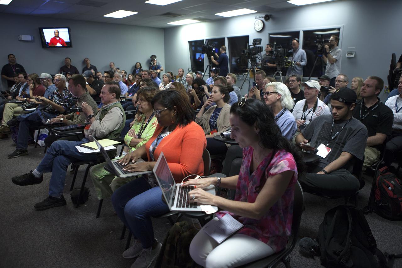 Members of the media attend a briefing in the Kennedy Space Center’s Press Site auditorium. The briefing focused on research planned for launch to the International Space Station. The scientific materials and supplies will be aboard a SpaceX Dragon spacecraft scheduled for liftoff from Cape Canaveral Air Force Station's Space Launch Complex 40. The SpaceX Falcon 9 rocket will launch the company's 15th Commercial Resupply Services mission to the space station.