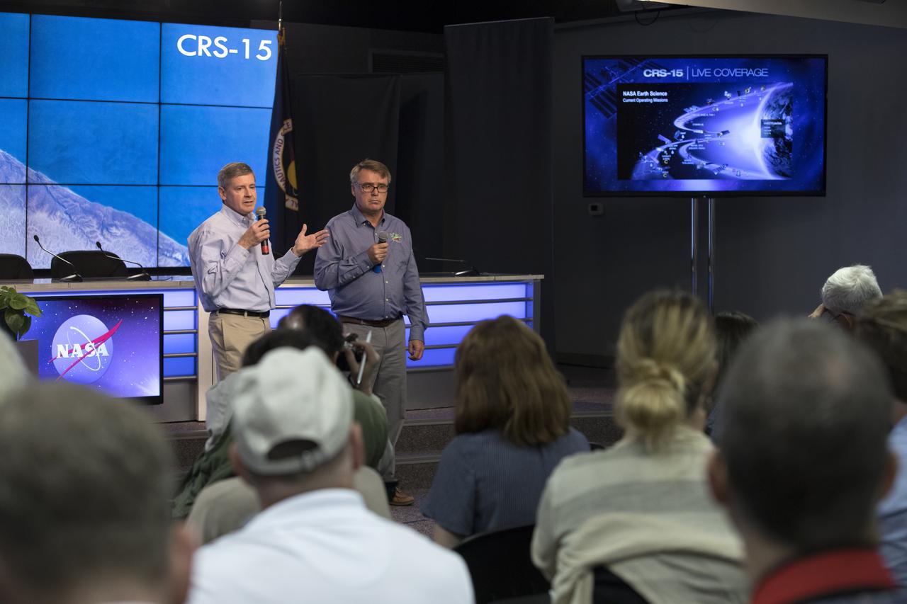 Woody Turner, ECOSTRESS program scientist, Earth Science Division, NASA Headquarters, left, and Simon Hook, ECOSTRESS principal investigator, NASA’S Jet Propulsion Laboratory, address members of the media during a briefing in the Kennedy Space Center’s Press Site auditorium. The briefing focused on research planned for launch to the International Space Station. The scientific materials and supplies will be aboard a SpaceX Dragon spacecraft scheduled for liftoff from Cape Canaveral Air Force Station's Space Launch Complex 40. The SpaceX Falcon 9 rocket will launch the company's 15th Commercial Resupply Services mission to the space station.