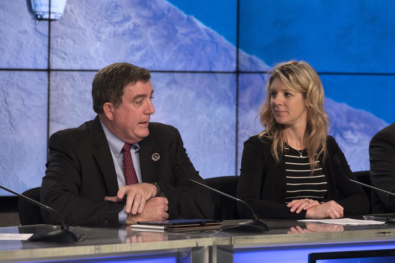 In the Kennedy Space Center’s Press Site auditorium, Kirk Shireman, manager of the International Space Station Program, left, and Jessica Jensen, director of Dragon Mission Management for SpaceX, speak to members of the media during a prelaunch news conference for the SpaceX CRS-15 Commercial Resupply Services mission to the International Space Station. A SpaceX Dragon spacecraft is scheduled to be launched from Space Launch Complex 40 at Cape Canaveral Air Force Station. The SpaceX Falcon 9 rocket will lift off on the company's 15th Commercial Resupply Services mission to the space station.
