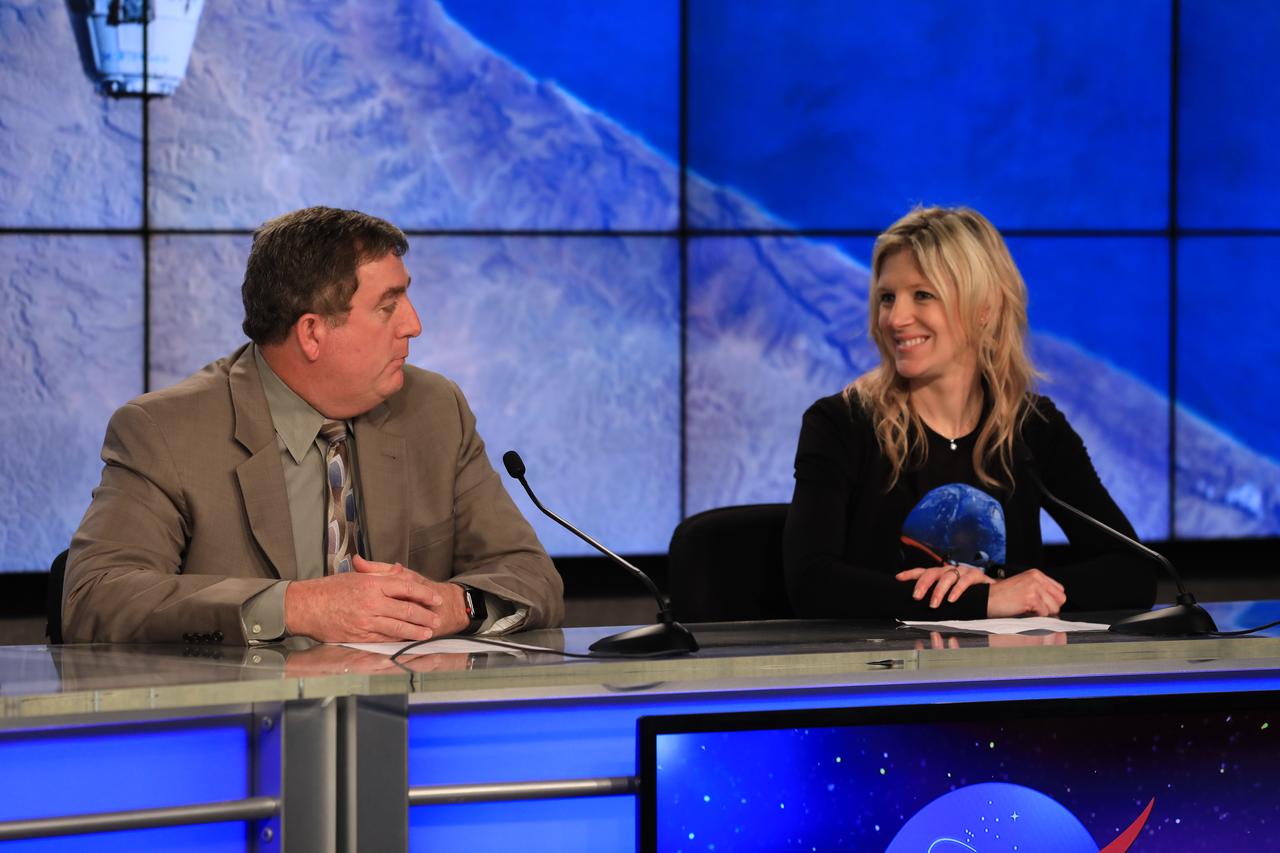 In the Press Site auditorium of NASA's Kennedy Space Center in Florida, from left, Kirk Shireman, manager, International Space Station Program, and Jessica Jensen, Director, Dragon Mission Management, SpaceX, speak to media at a post-launch news conference following the liftoff of SpaceX CRS-15. The flight is a commercial resupply services mission to the International Space Station. SpaceX CRS-15 lifted off atop a Falcon 9 rocket from Space Launch Complex 40 at Cape Canaveral Air Force Station on Friday, June 29, 2018, at 5:42 a.m. EDT with supplies and materials to support multiple critical science and research investigations.