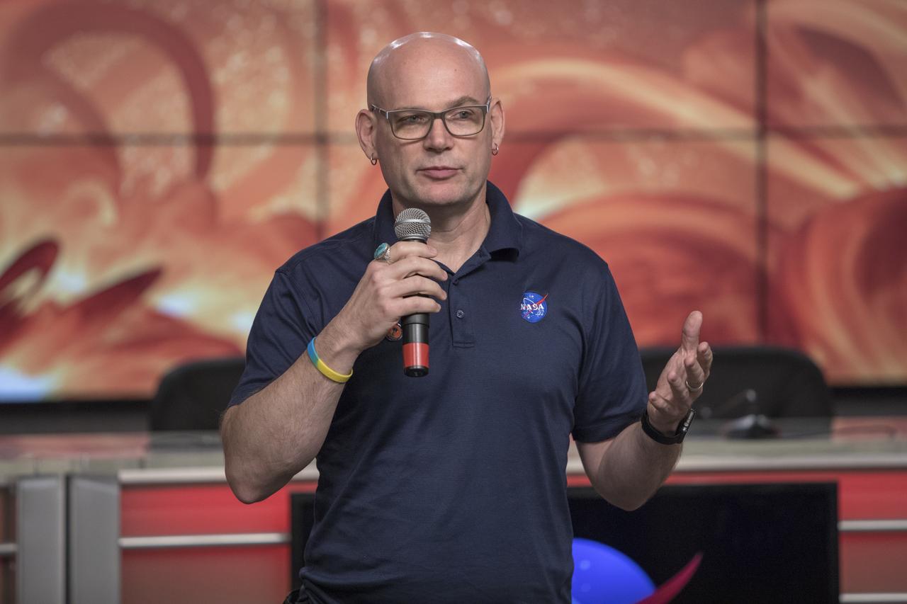 In the Kennedy Space Center’s Press Site auditorium, on Friday, July 20, 2018, Alex Young, solar scientist at NASA's Goddard Space Flight Center in Greenbelt, Maryland, speaks to members of the media during a prelaunch mission briefing for the Parker Solar Probe mission. The Parker Solar Probe will lift off on a United Launch Alliance Delta IV Heavy rocket from Space Launch Complex 37 at Cape Canaveral Air Force Station in Florida. The spacecraft was built by Applied Physics Laboratory of Johns Hopkins University in Laurel in Maryland. The mission will perform the closest-ever observations of a star when it travels through the Sun's atmosphere, called the corona. The probe will rely on measurements and imaging to revolutionize understanding of the corona and the Sun-Earth connection.
