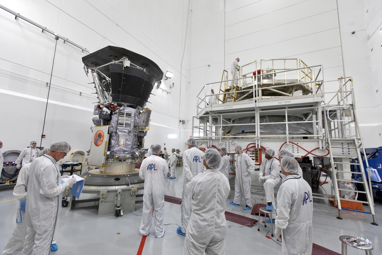 In the Astrotech processing facility in Titusville, Florida, near NASA's Kennedy Space Center, on Wednesday, July 11, 2018, technicians and engineers prepare to mate NASA's Parker Solar Probe to its third stage, built and tested by Northrup Grumman in Chandler Arizona. The Parker Solar Probe will launch on a United Launch Alliance Delta IV Heavy rocket from Space Launch Complex 37 at Cape Canaveral Air Force Station in Florida. The mission will perform the closest-ever observations of a star when it travels through the Sun's atmosphere, called the corona. The probe will rely on measurements and imaging to revolutionize our understanding of the corona and the Sun-Earth connection.