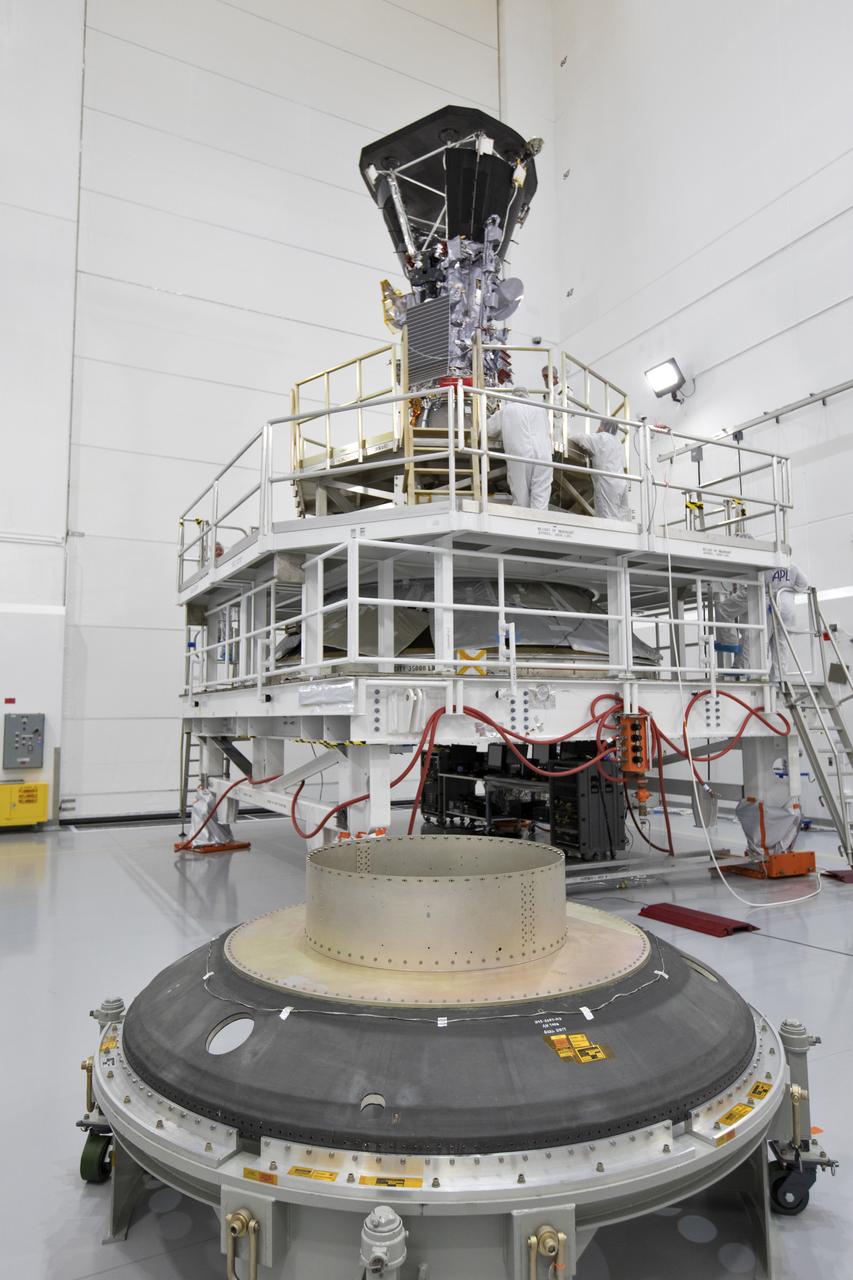 In the Astrotech processing facility in Titusville, Florida, near NASA's Kennedy Space Center, on Wednesday, July 11, 2018, technicians and engineers mate NASA's Parker Solar Probe to its third stage, built and tested by Northrup Grumman in Chandler Arizona. The Parker Solar Probe will launch on a United Launch Alliance Delta IV Heavy rocket from Space Launch Complex 37 at Cape Canaveral Air Force Station in Florida. The mission will perform the closest-ever observations of a star when it travels through the Sun's atmosphere, called the corona. The probe will rely on measurements and imaging to revolutionize our understanding of the corona and the Sun-Earth connection.