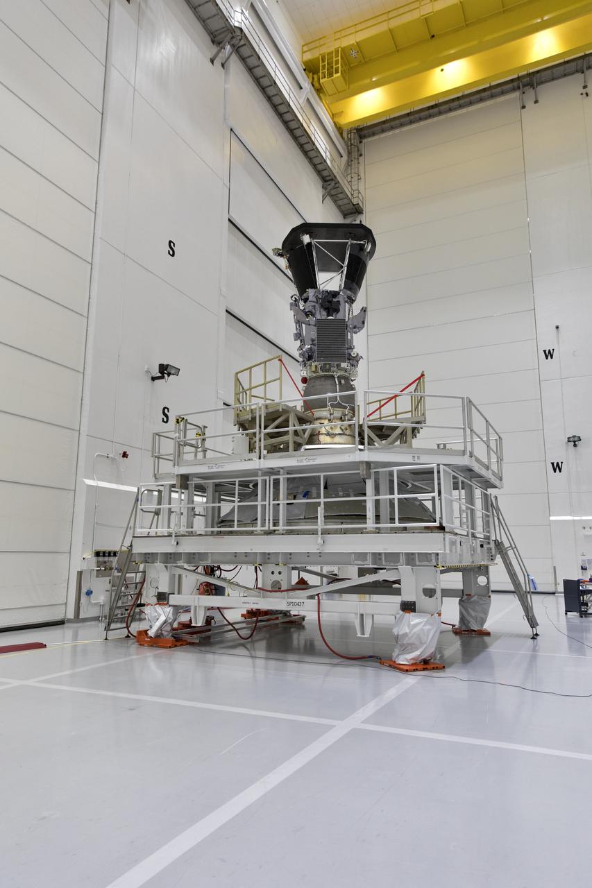 NASA's Parker Solar Probe stands inside the airlock at Astrotech processing facility in Titusville, Florida, near NASA's Kennedy Space Center, on Friday, July 13, 2018. The Parker Solar Probe will launch on a United Launch Alliance Delta IV Heavy rocket from Space Launch Complex 37 at Cape Canaveral Air Force Station in Florida. The mission will perform the closest-ever observations of a star when it travels through the Sun's atmosphere, called the corona. The probe will rely on measurements and imaging to revolutionize our understanding of the corona and the Sun-Earth connection.